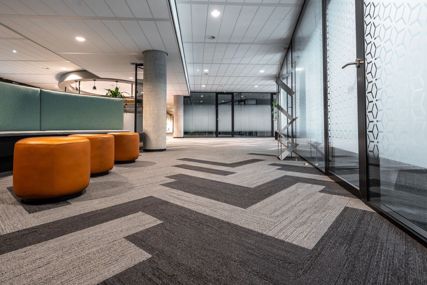 Modern office hallway with carpet cleaned by BluePeak Cleaning Co.