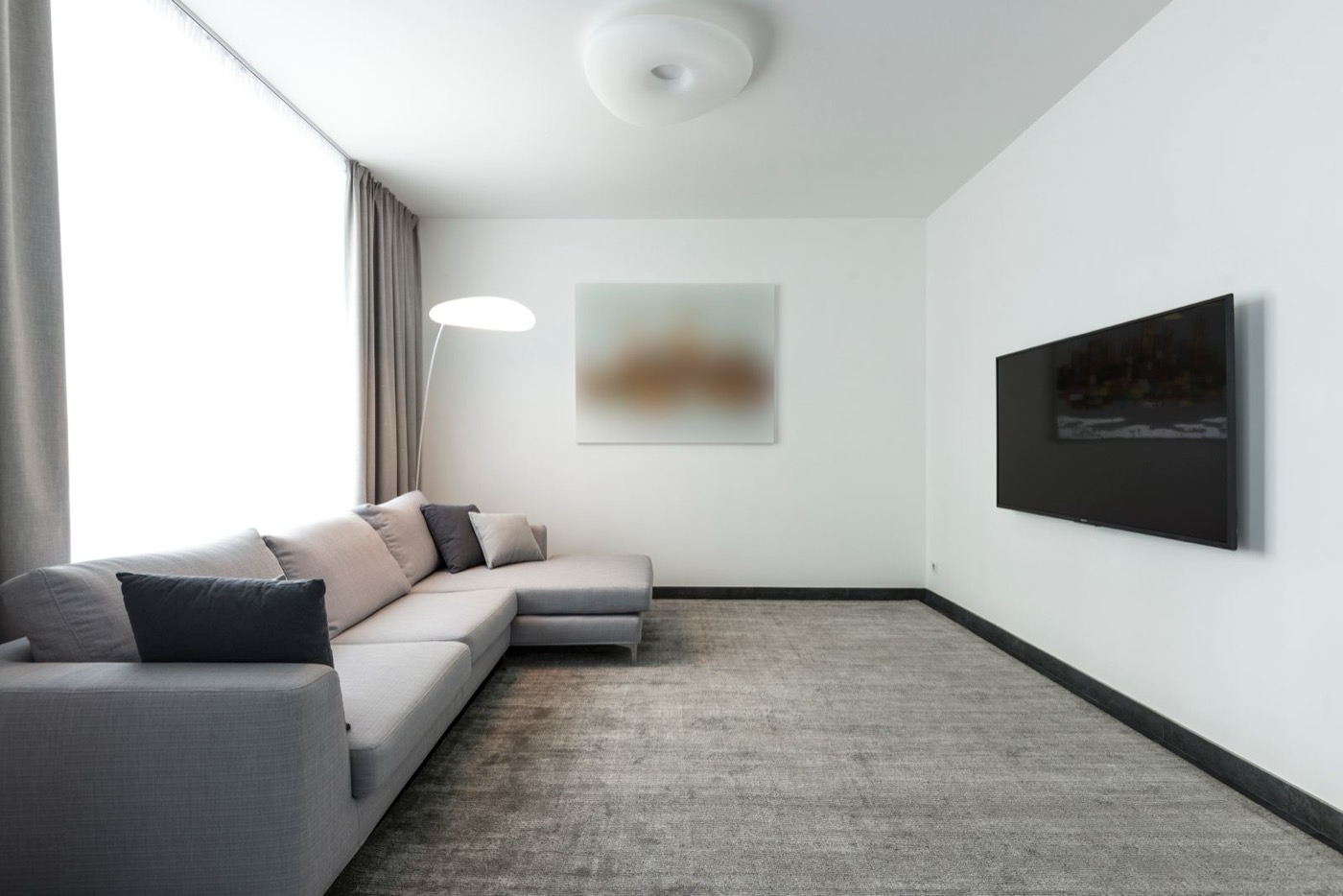 Gray sectional sofa cleaned by BluePeak Cleaning Co.